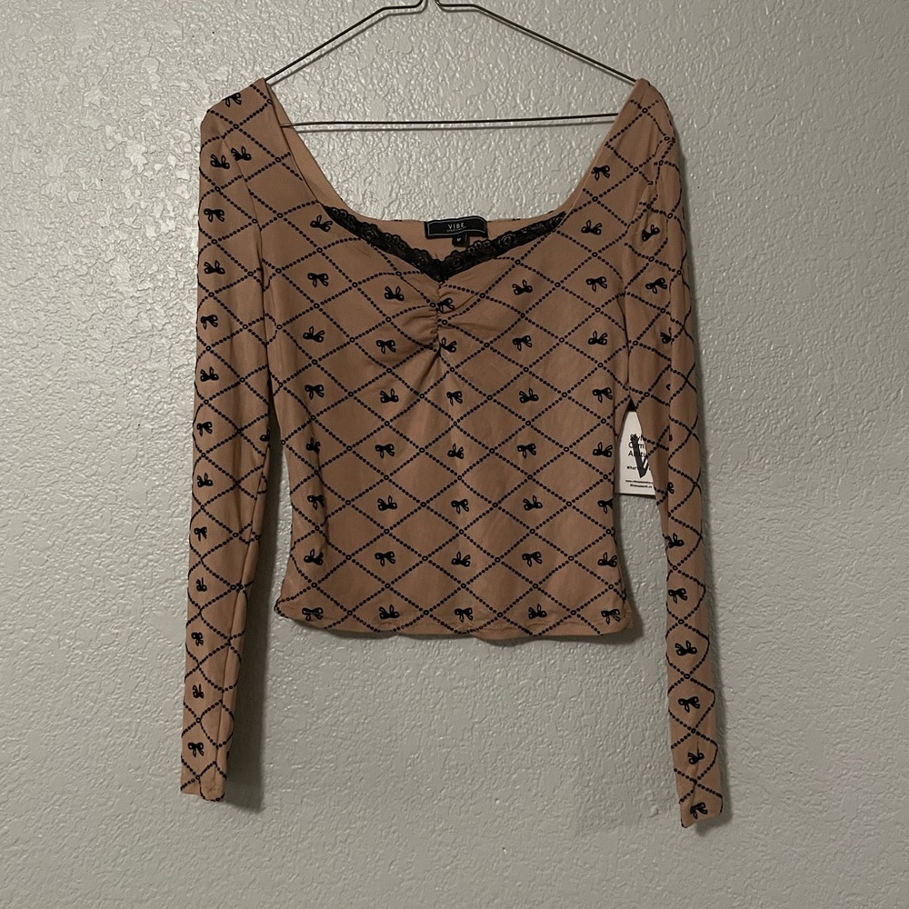 New long sleeve mesh bow top